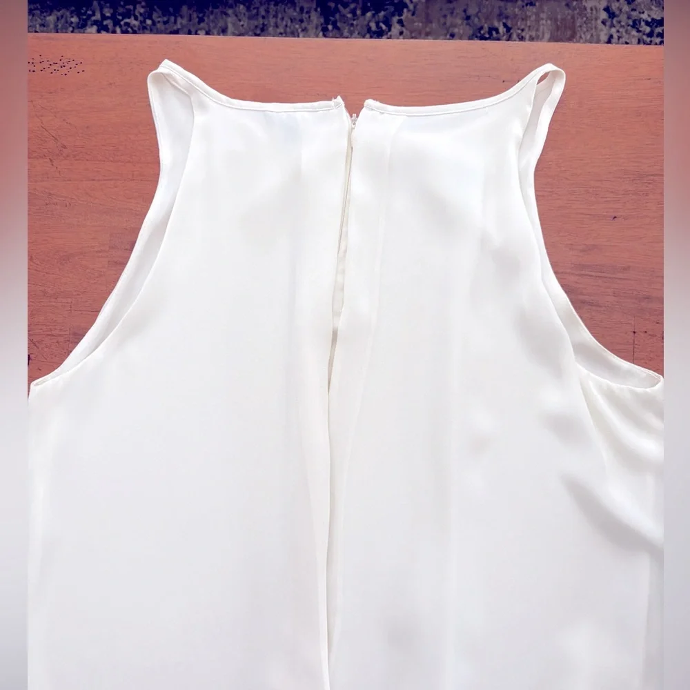 Sleeveless white blouse. Chiffon Layered bottom and longer back. Large - Picture 7 of 13